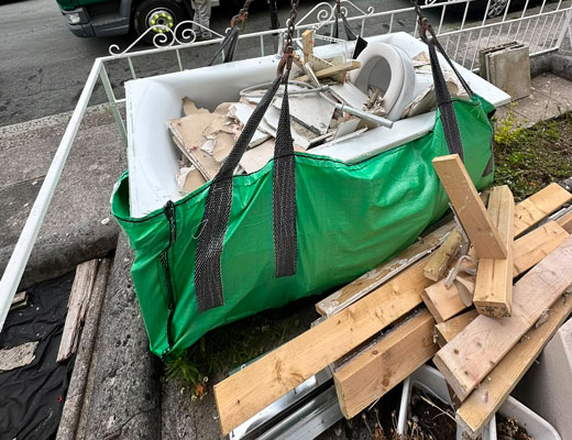 Skip Bag Hire in Exeter. Full Skip bag showing waste and capacity.